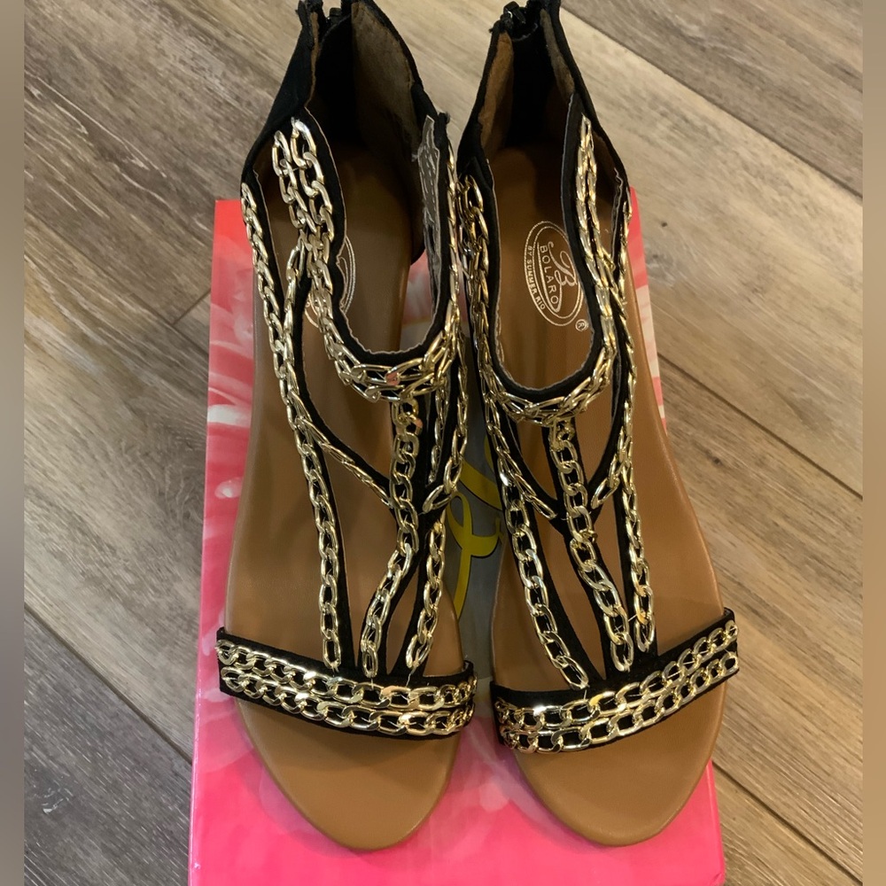 Volatile cork wedge with gold chain details. Size 7.5. NWT